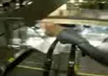 girl_spins_on_escalator