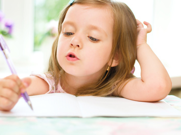 Як навчити дитину писати?