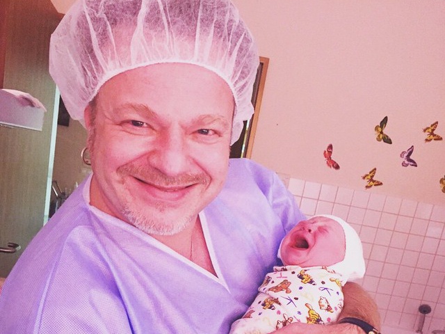 Владимир Пресняков с ребенком