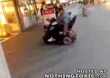 fat_old_man_does_scooter_stunts