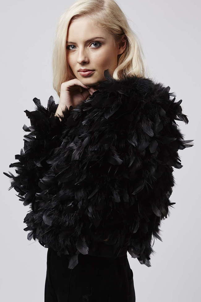 Меховые жилеты и шубы