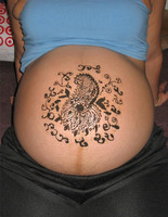 тату на жіночому тілі