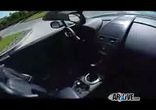 Голубой Aston Martin V8 Vantage Roadster