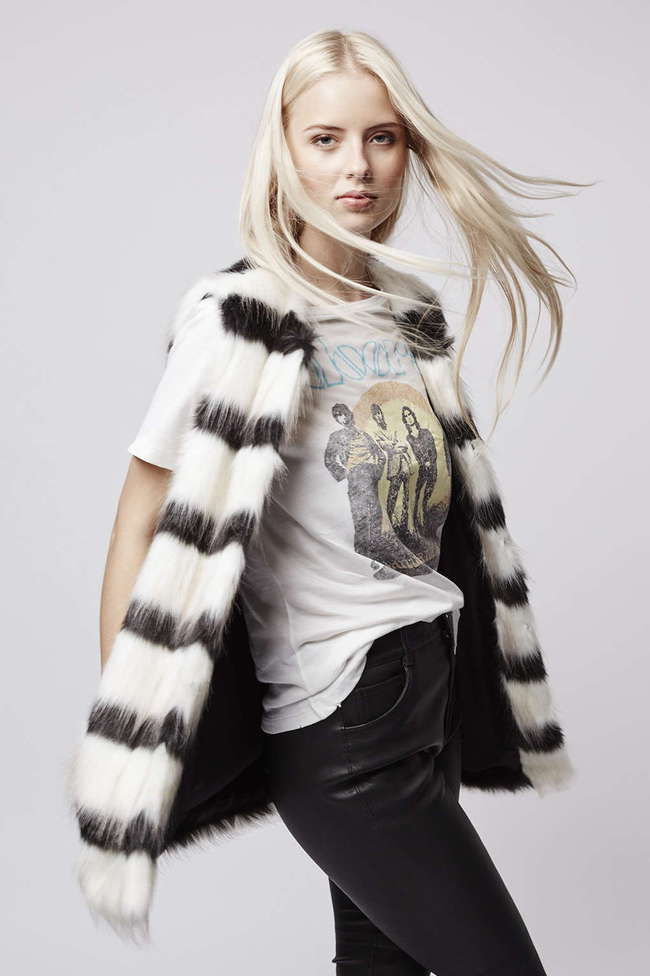 Меховые жилеты и шубы