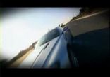 Серебристый Aston Martin V8 vantage coupe